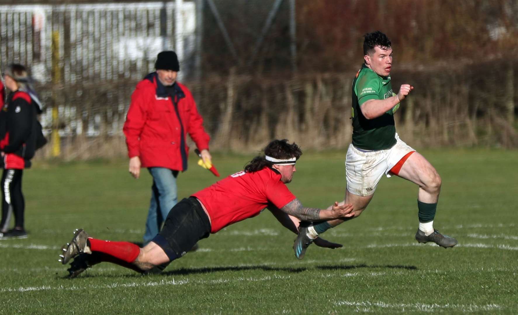 The defeat to Glenrothes came a week after Caithness had beaten them 75-8 in Thurso. Here, Charlie Quinn evades an opponent during the Millbank game. Picture: James Gunn