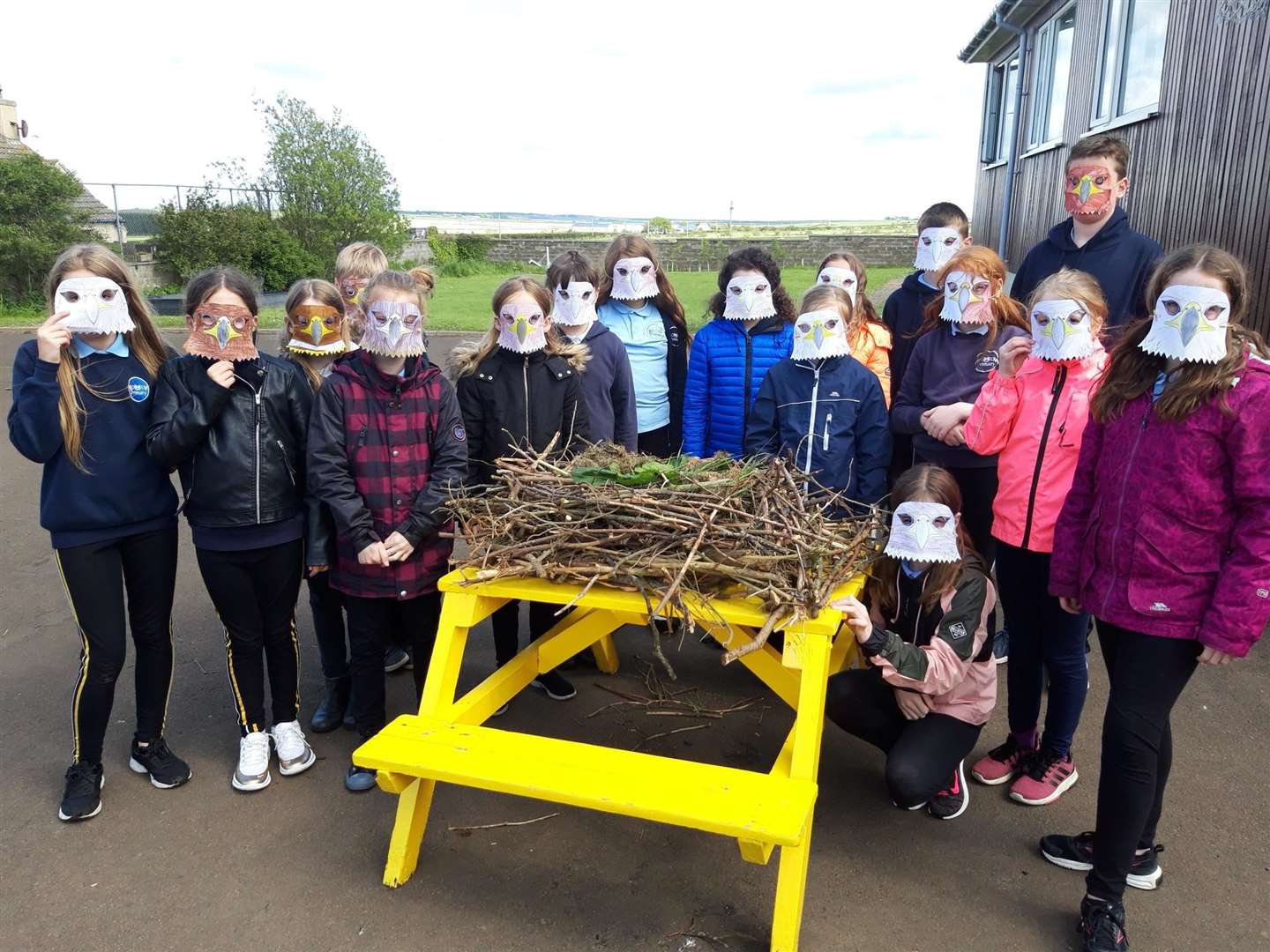 Bower P5-7 class sporting their eagle masks and showing off their life-sized golden eagle's nest.