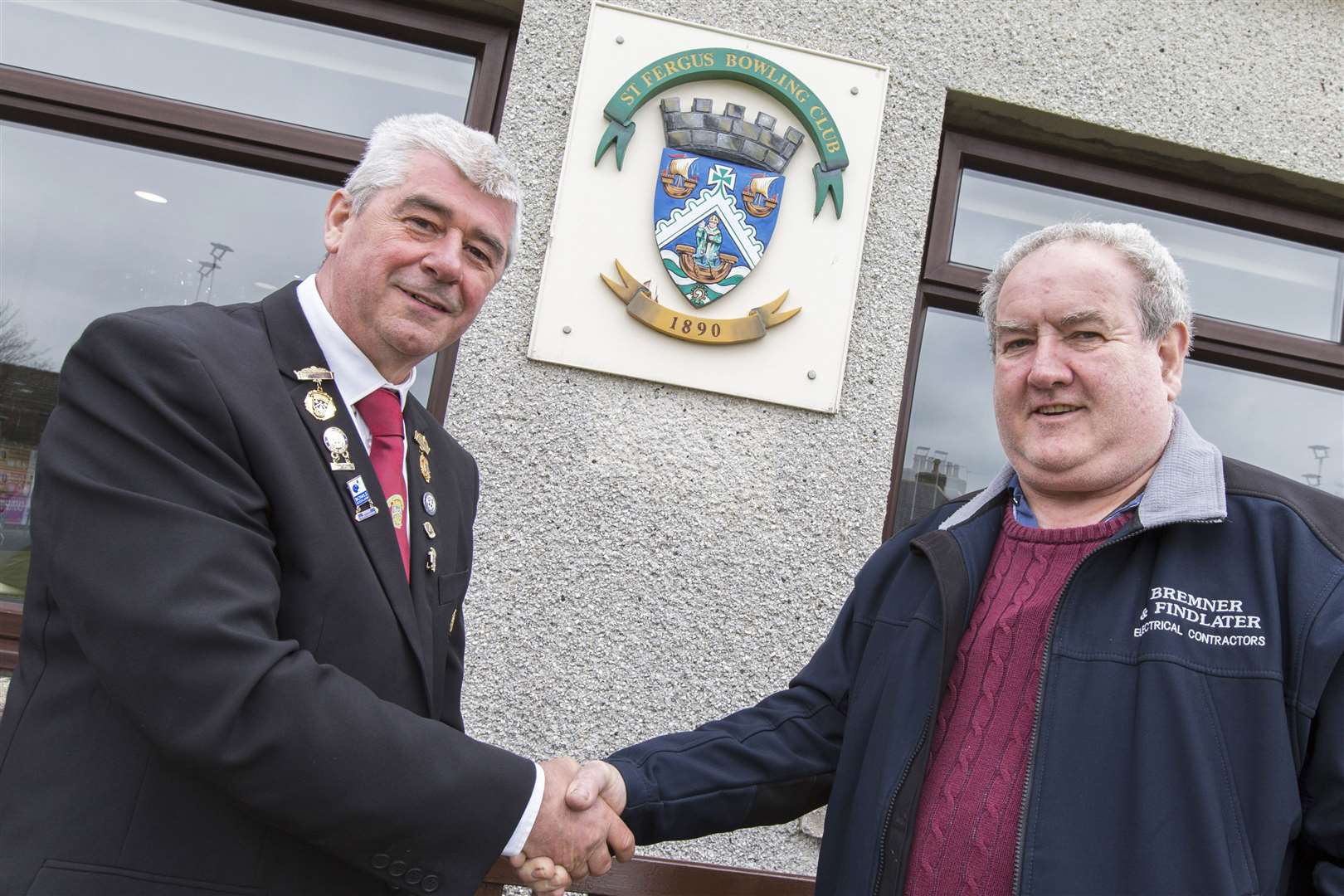 Robert Bremner (right), of Bremner and Findlater Electrical Contractors, was presented with an honorary life membership of St Fergus Bowling Club. He is pictured with club president Malky Mackay. Picture: Robert MacDonald / Northern Studios