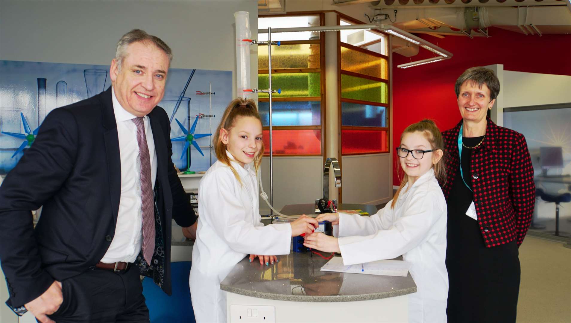 Richard Lochhead MSP declared the Newton Room open. He is pictured with Carroll Buxton from Highlands and Islands Enterprise and budding young scientists Alisha Cooper (second left) and Kaitlyn Manson.