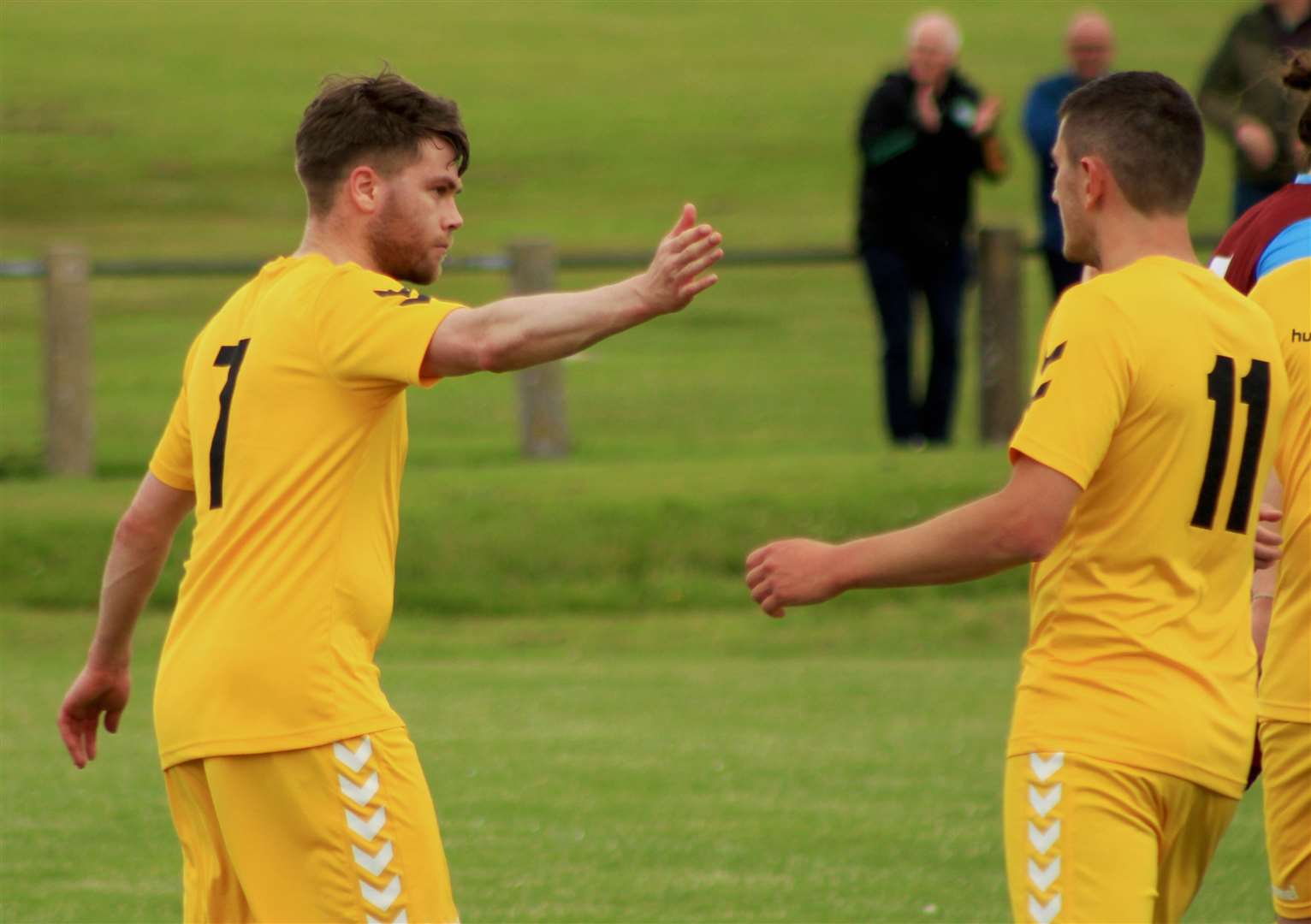 Chrissy Green (left) takes the acclaim after his head-flick briefly brought Staxigoe United level in the first half.