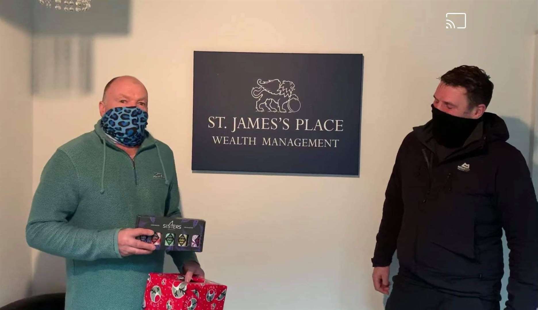 Brian Cormack (left), Thurso Bowling Club's sponsorship convener and press secretary, doing the Ginsmas prize draw with Gary Youngson, of St James's Place Wealth Management. Gary sponsors the ladies' championship and the gents' Allan Cup.