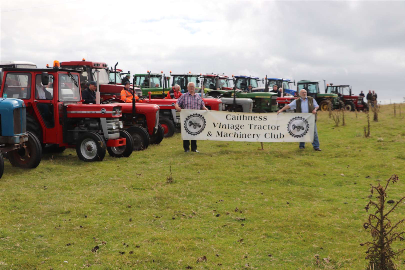Displaying the Caithness Vintage Tractor and Machinery Club banner during the Ernest McAdie memorial tractor road run. Picture: Brian Polson
