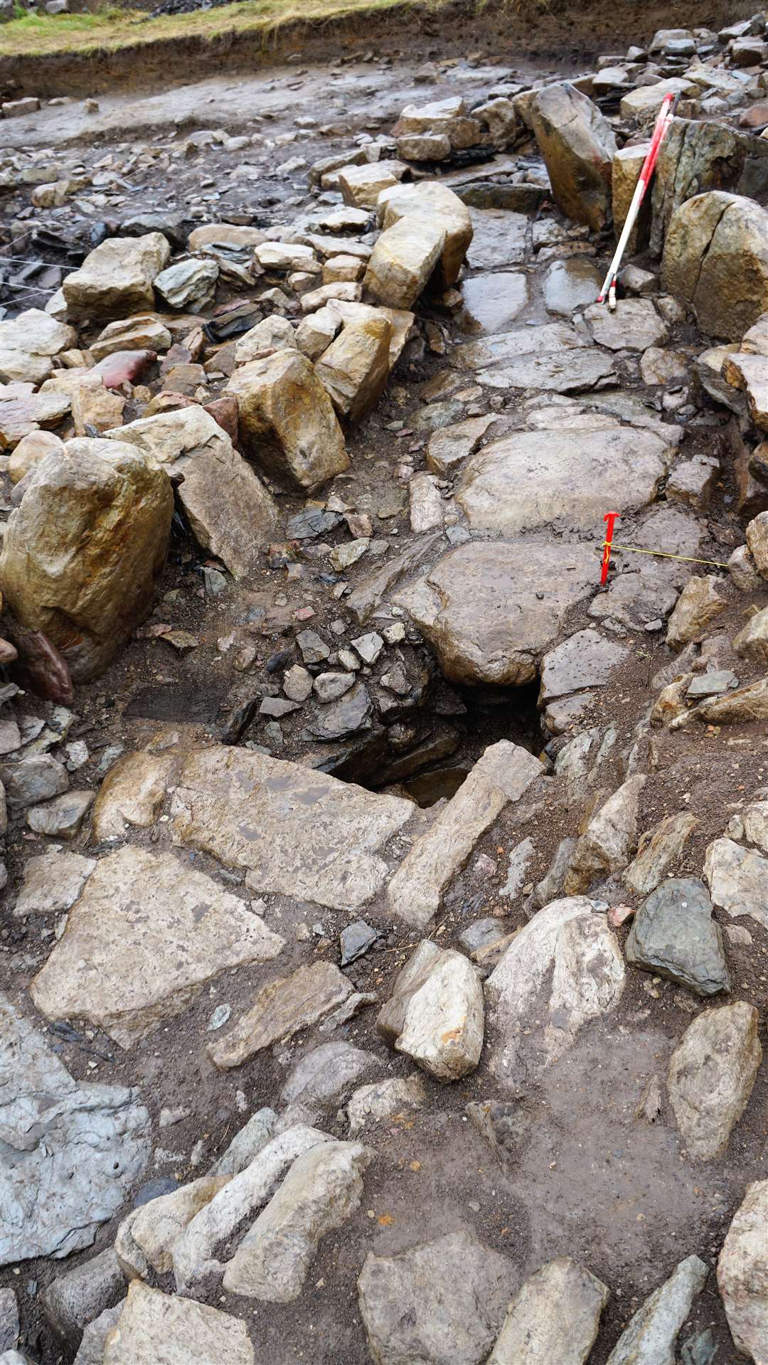 This part of the dig at Swartigill appears to be a souterrain and may have been used to store food. It was recently discovered that there are channels under it that may have allowed water to flow through to help cool and preserve the larder.