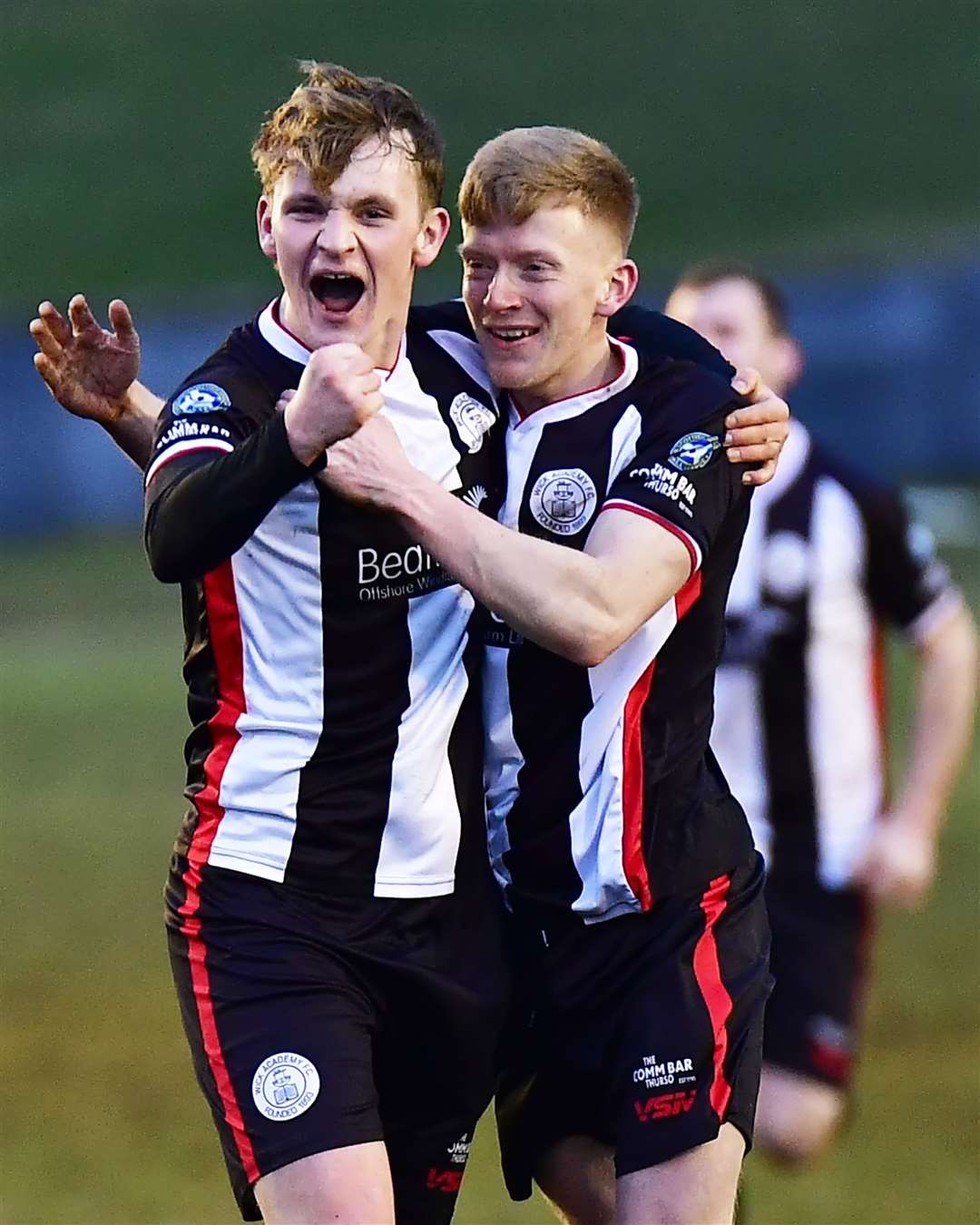 Mark Macadie (left) is congratulated by Ross Gunn after rounding off the scoring in the 3-1 win against Formartine United. Picture: Mel Roger