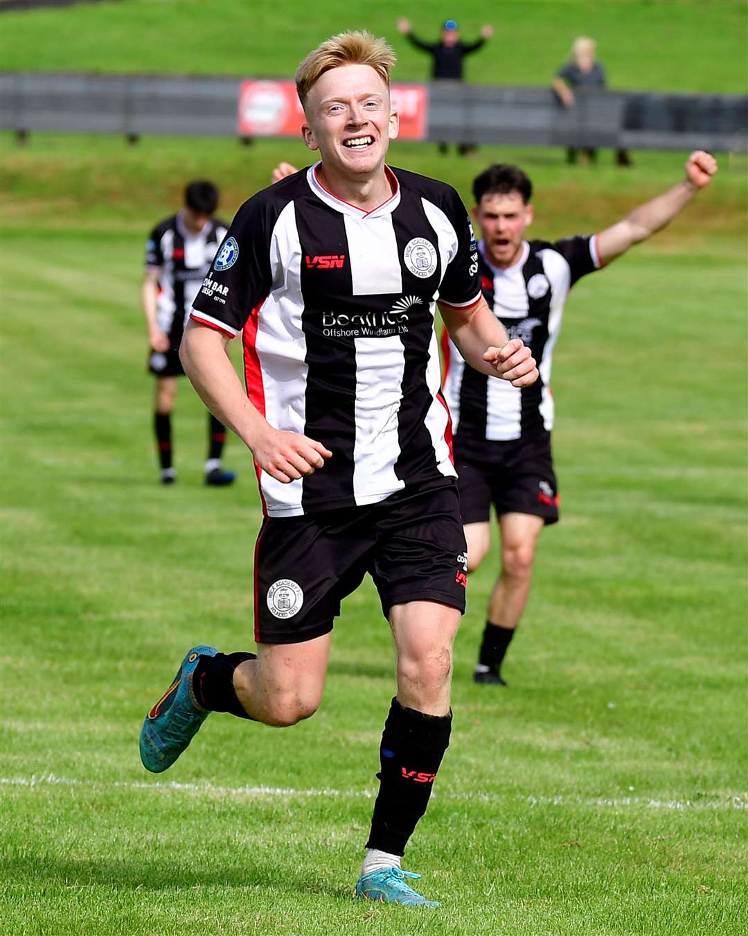 Ross Gunn celebrates after sealing the victory with Wick Academy's second goal in the 89th minute. Picture: Mel Roger