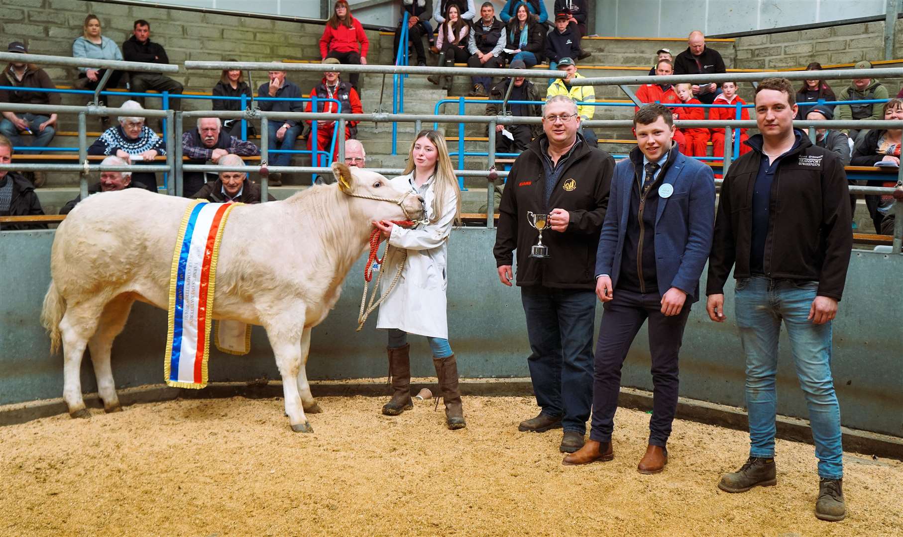 Young Farmers champion Sophie Tucker with sponsor Andrew Mackay, judge Craig Buchan and sponsor Ross Bremner. Picture: DGS