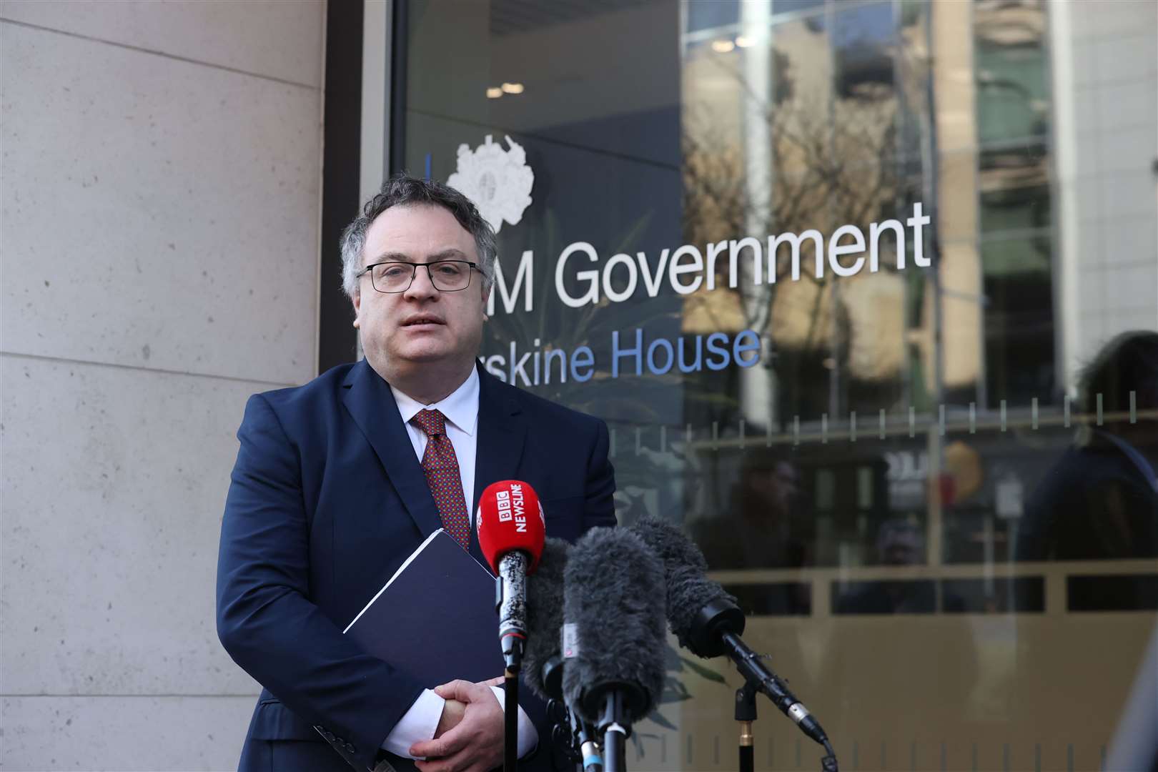 Alliance Party MP Stephen Farry speaking to the media outside Erskine House, Belfast (Liam McBurney/PA)