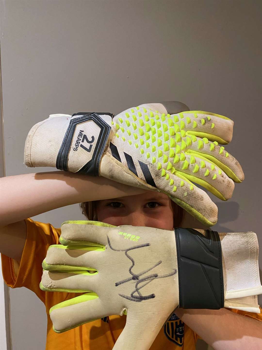 The gloves have been worn and signed by Mary Earps (handout/PA)