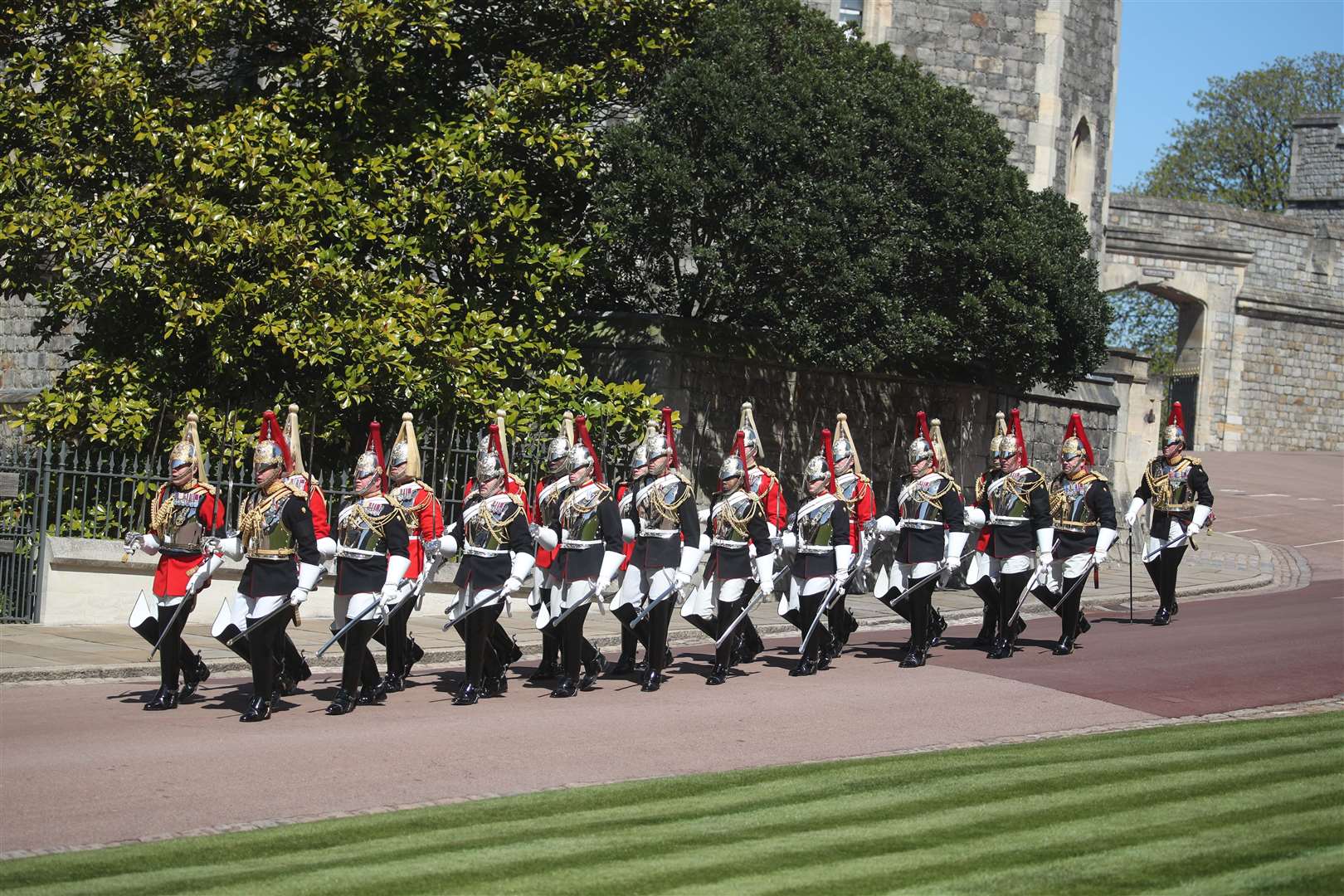 A dismounted detachment of The Life Guards and The Blues & Royals of The Household Cavalry arrive at Windsor Castle (Steve Parsons/PA)