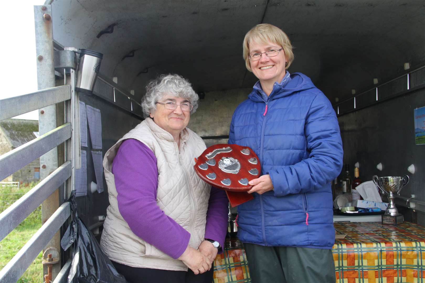 Fiona MacDonald (right) of Forss receives the ladies' shield from Sheila Cormack of Wester Farm. Picture: Willie Mackay