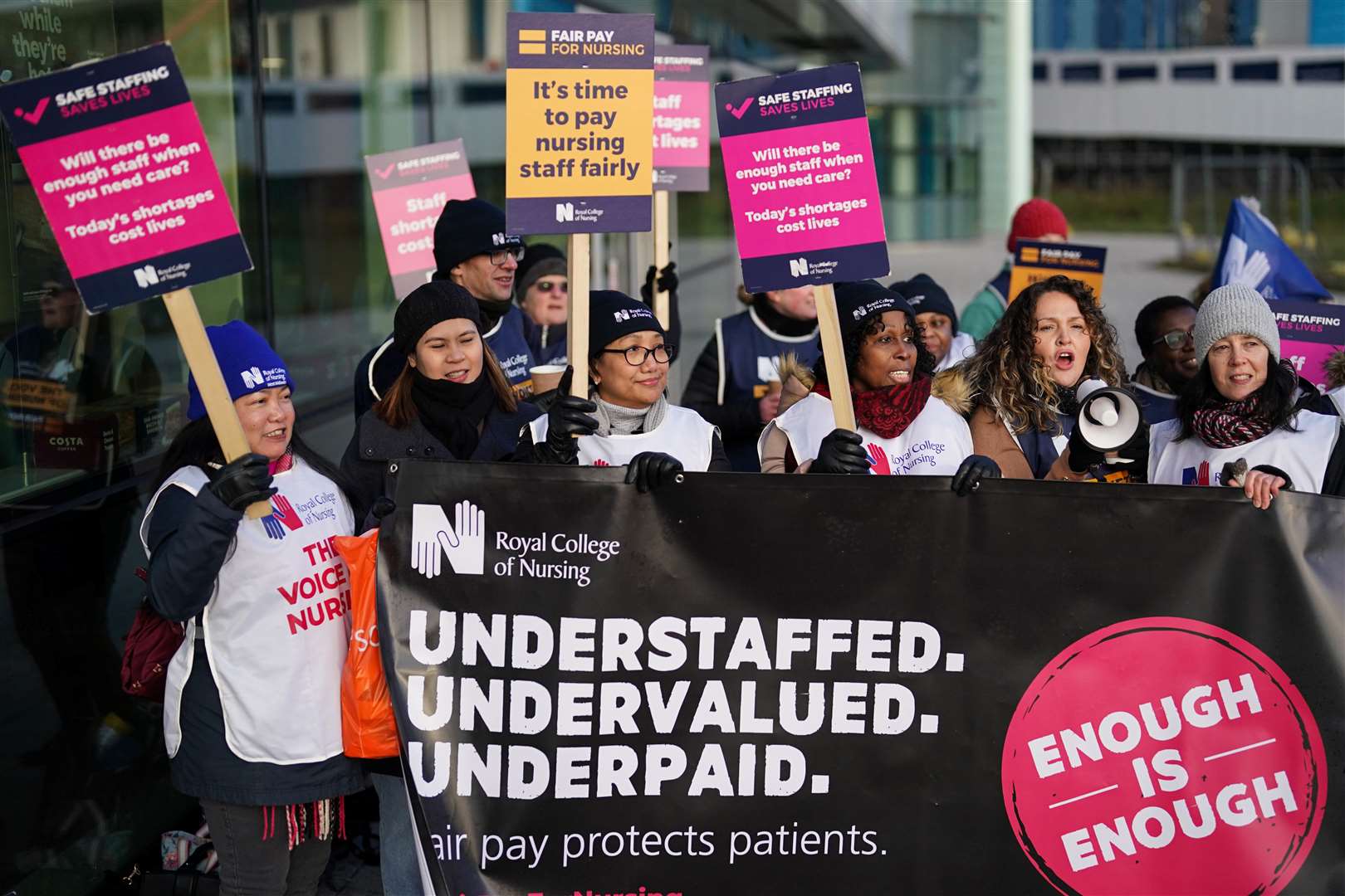 Workers on the picket line outside Queen Elizabeth Hospital Birmingham (Jacob King/PA)