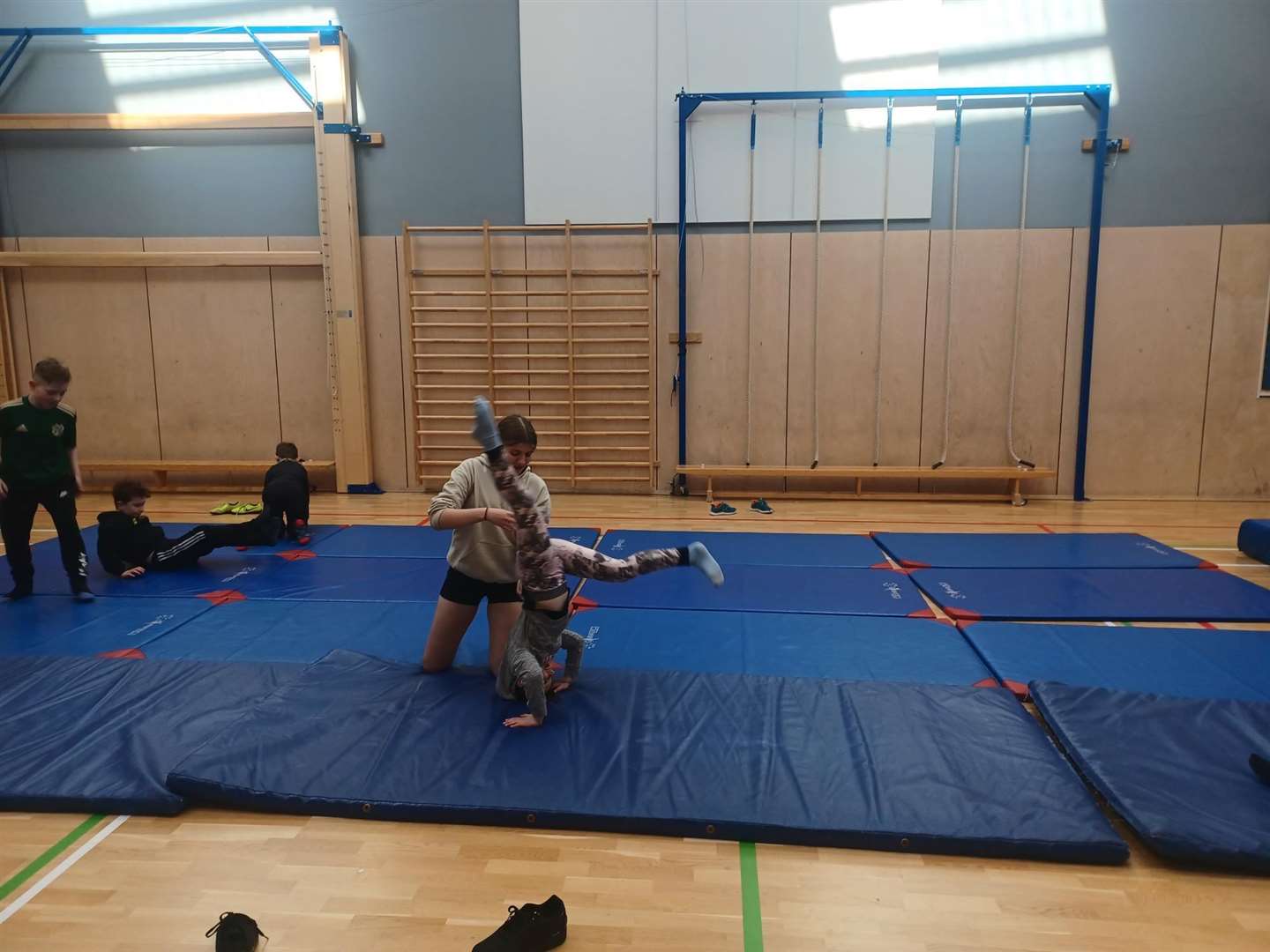 Learning good techniques at gymnastics.