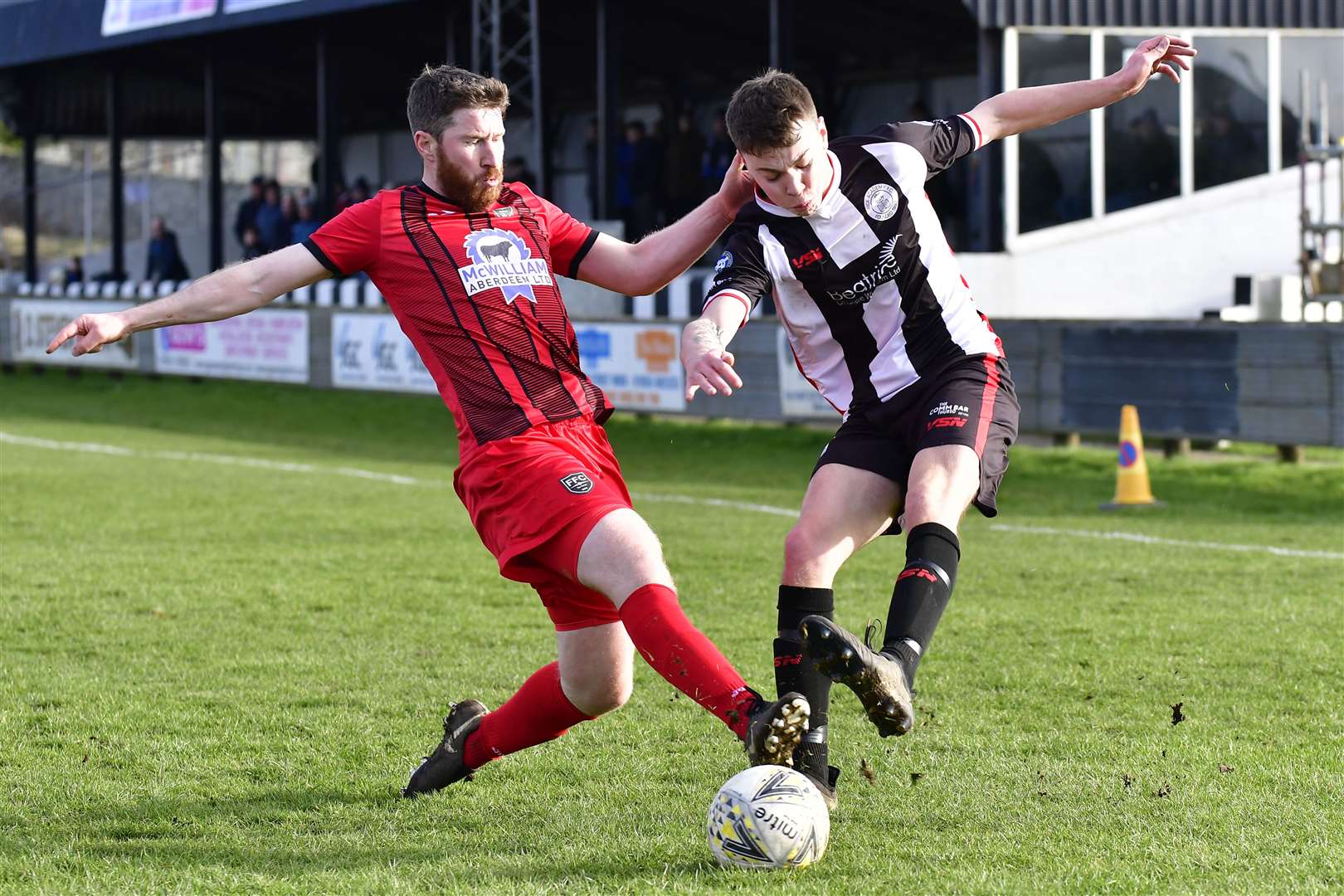 Flashback to Fraserburgh's 6-0 victory at Harmsworth Park in March this year: Wick's Conor Farquhar gets a cross away before Jamie Beagrie can block it. Picture: Mel Roger