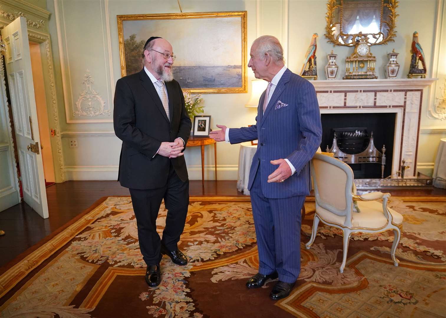 The King welcomes the Chief Rabbi Sir Ephraim Mirvis to Buckingham Palace (Yui Mok/PA)