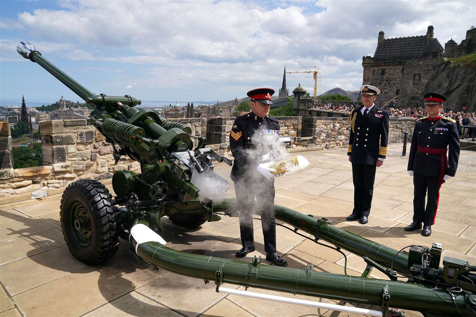 Chief of Defence Admiral Sir Tony Radakin with Brigadier Ben Wrench (right) after watching District Gunner Sgt David Beveridge fire the One O’Clock Gun at Edinburgh Castle (Andrew Milligan/PA)