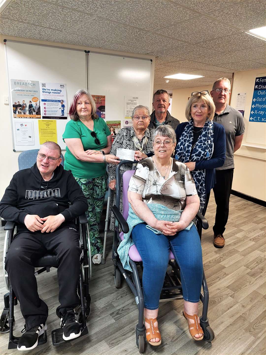 The wheelchairs are delivered to Caithness General Hospital in Wick thanks to the Caithness Disabled Access Panel (CDAP). From left at rear, CDAP panel member and local councillor Jan McEwan, Helen Budge CDAP chair, John Niwa CDAP member, Pam Garbe head of hospital, Alan Tait CVG support for CDAP. Front from left, CDAP members Chris and Syd Morrice.
