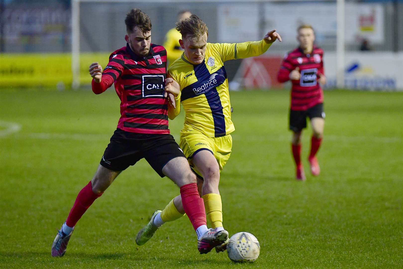 Wick Academy's Mark Macadie and Inverurie Locos' Josh Buchan challenge for possession at Harlaw Park. Picture: Mel Roger