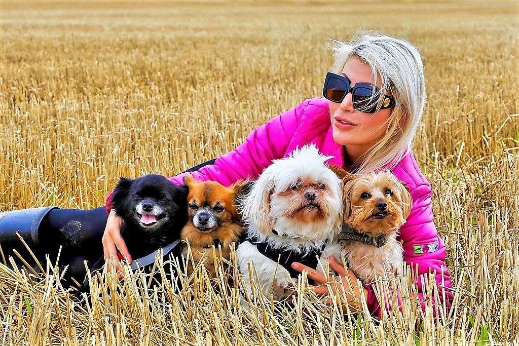 Natalie Oag with dogs Louis Vuitton, Benjamin Buttons, Princess Tia and Gizmo after a 5km walk on day 23.