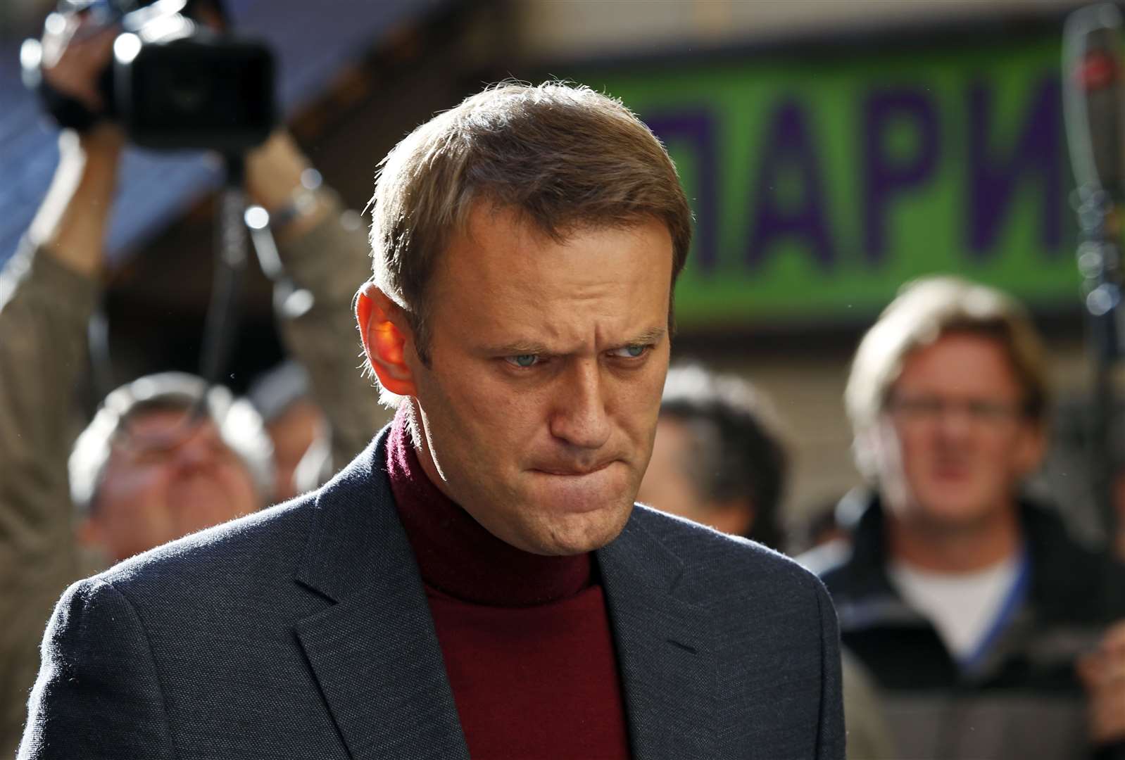 Mr Navalny had crusaded against official corruption and staged massive anti-Kremlin protests (Alexander Zemlianichenko/AP)