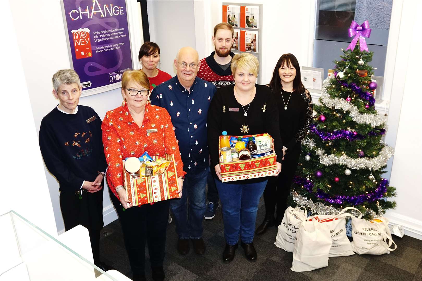 From left: Janice McCarthy, Emily Fraser, Grant Ramsay (Caithness Foodbank), Maria Paterson and Lorraine Sutherland, with Kimberly Miller-Rosie and David Morris-Ashton at the back.