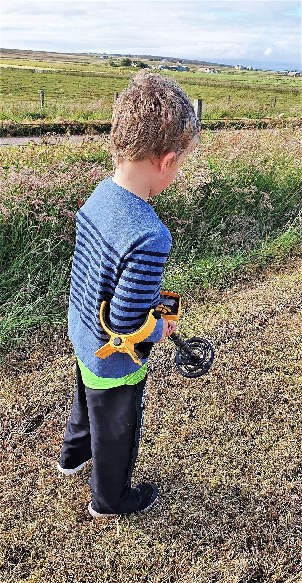 Finlay Aitken out metal detecting in the Gills area. Picture: Chris Aitken