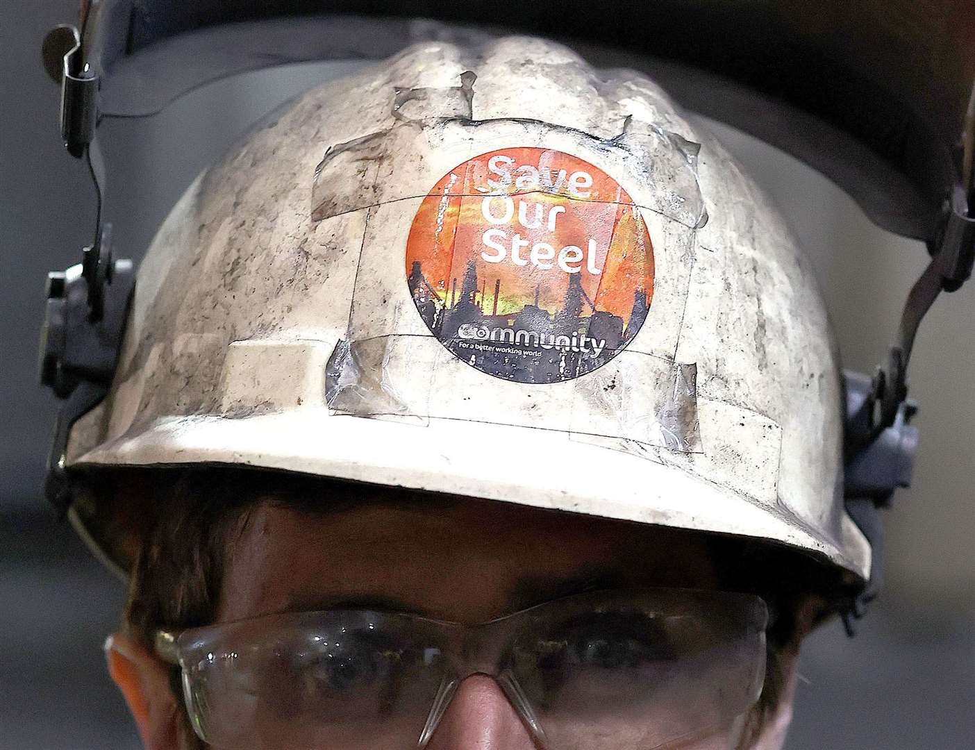 A Save our Steel sticker on the helmet of a worker at the British Steel site in Scunthorpe, North Lincolnshire, during a visit by Business Secretary Jonathan Reynolds (Darren Staples/PA)