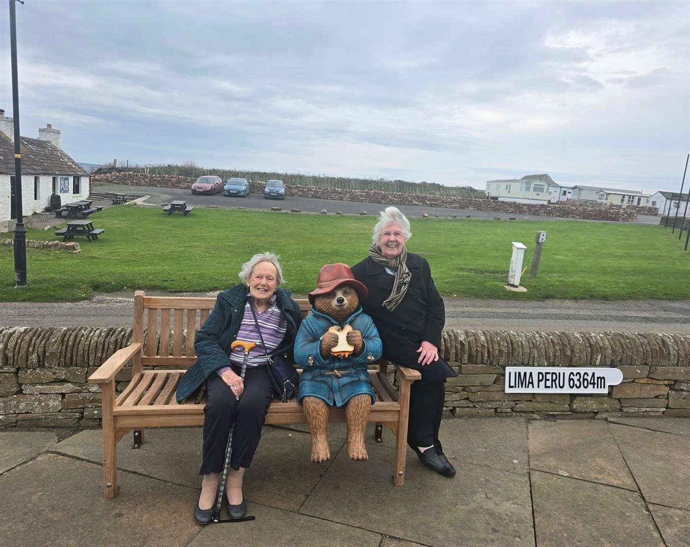 Isabel and Linda have a chat with Paddington.