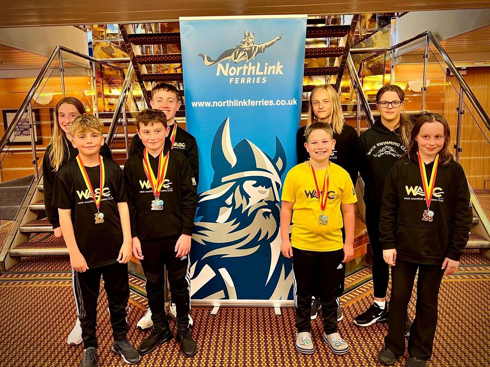 Wick swimmers who competed in the the Pentland Pentaqua in Stromness.
