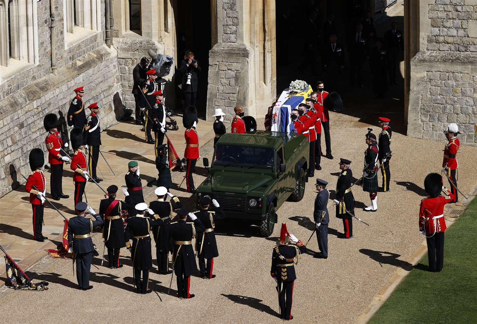 The Duke of Edinburgh’s coffin is carried to the purpose-built Land Rover Defender ahead of his funeral at Windsor Castle, Berkshire (Adrian Dennis/PA)