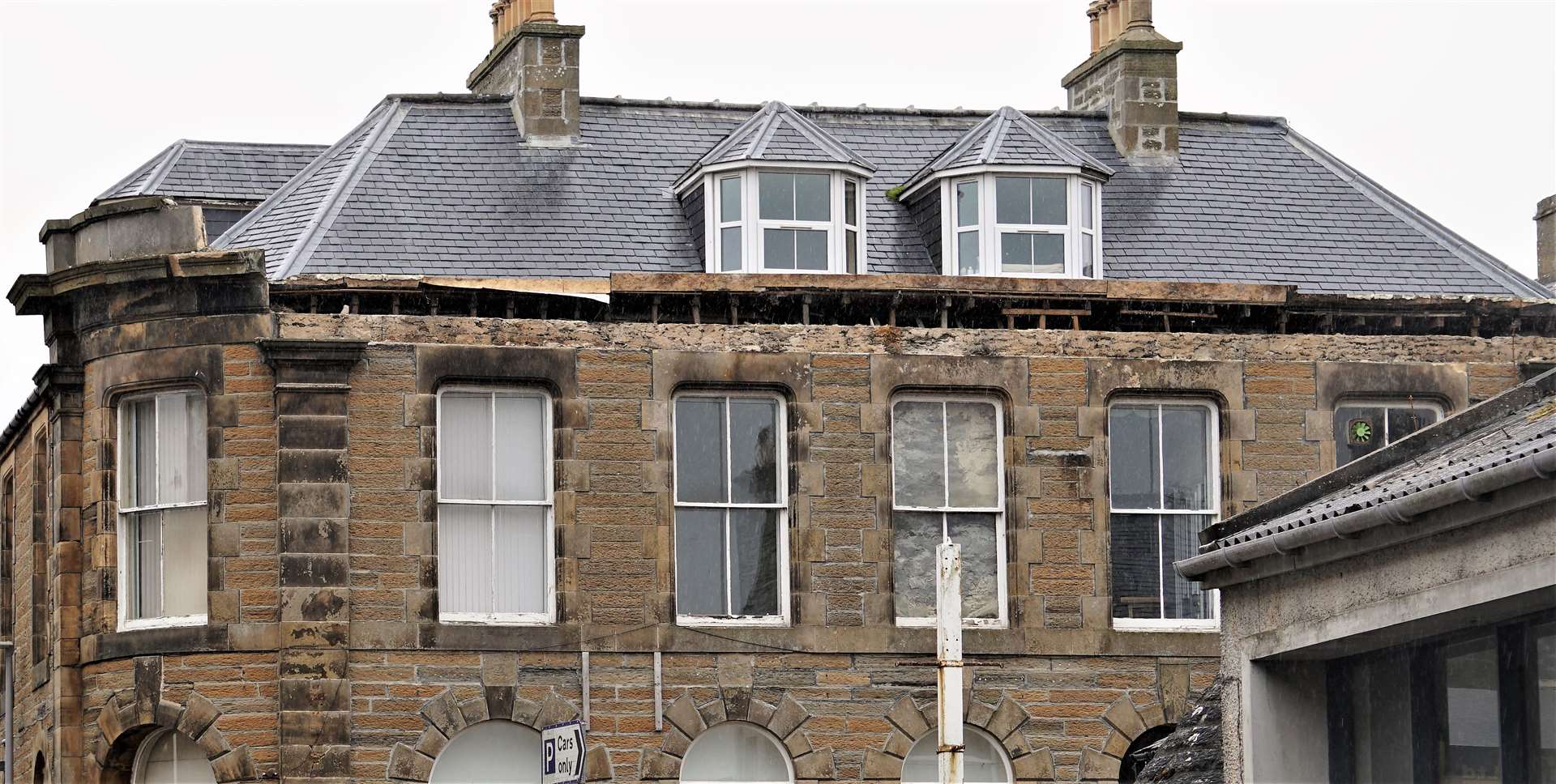 The roof parapet showing where the huge sandstone blocks fell from. Professional artist and jewellery maker Lindsey Gallacher has a studio and shop directly under it. Picture: DGS