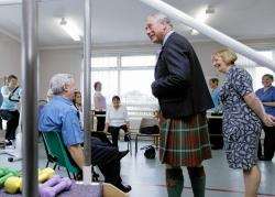 His Royal Highness finds out about the work carried out in the physiotherapy department. Photos from Caithness General Hospital: John Baikie / Captive8.
