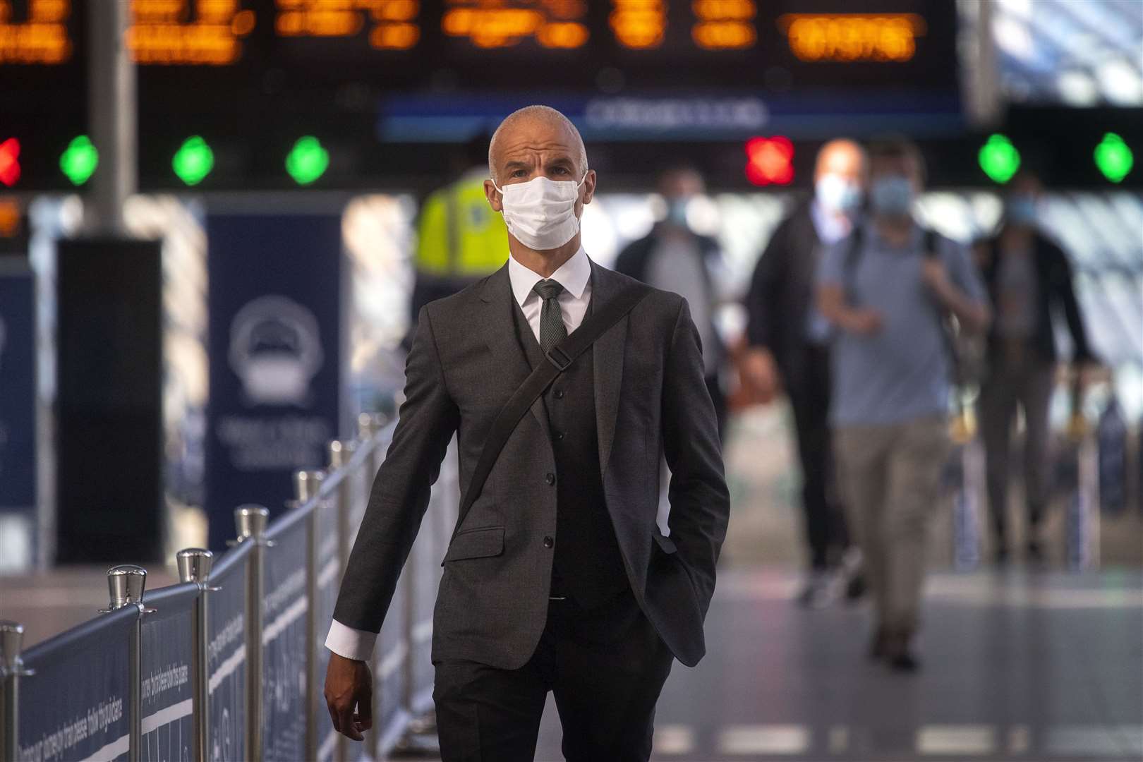 Passengers wearing face masks at Waterloo station (Victoria Jones/PA)