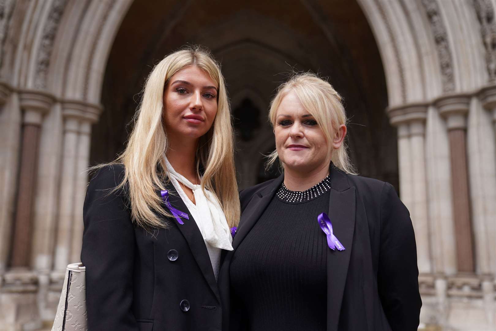 Archie Battersbee’s mother, Hollie Dance (right) with family friend Ella Carter, outside the High Court in London (Kirsty O’Connor/PA)