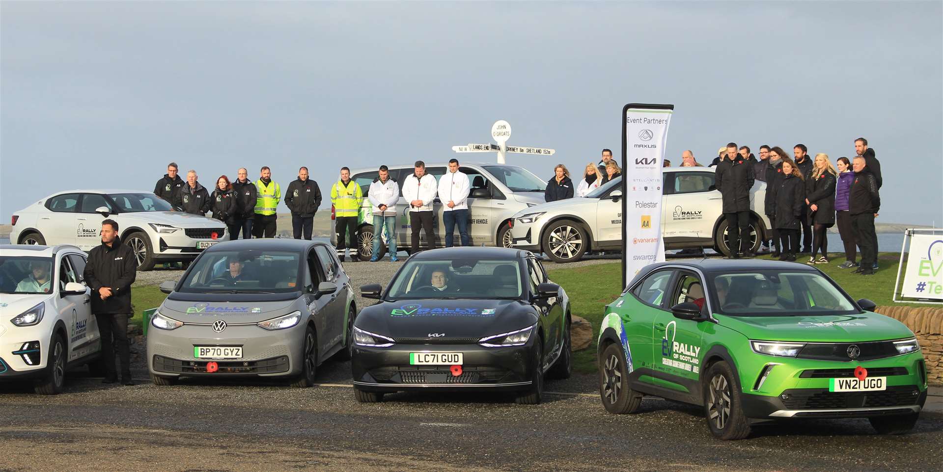 Crews taking part in the EV Rally of Scotland gather at the John O'Groats signpost to show their respects at 11am on Armistice Day.