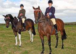 Ridden horse champion Ruth Sutherland (left) on The Puzzlemaster, along with reserve champion Lisa Kennedy on Stemster Millenium Bug. Photo: www.jamesgunn.co.uk