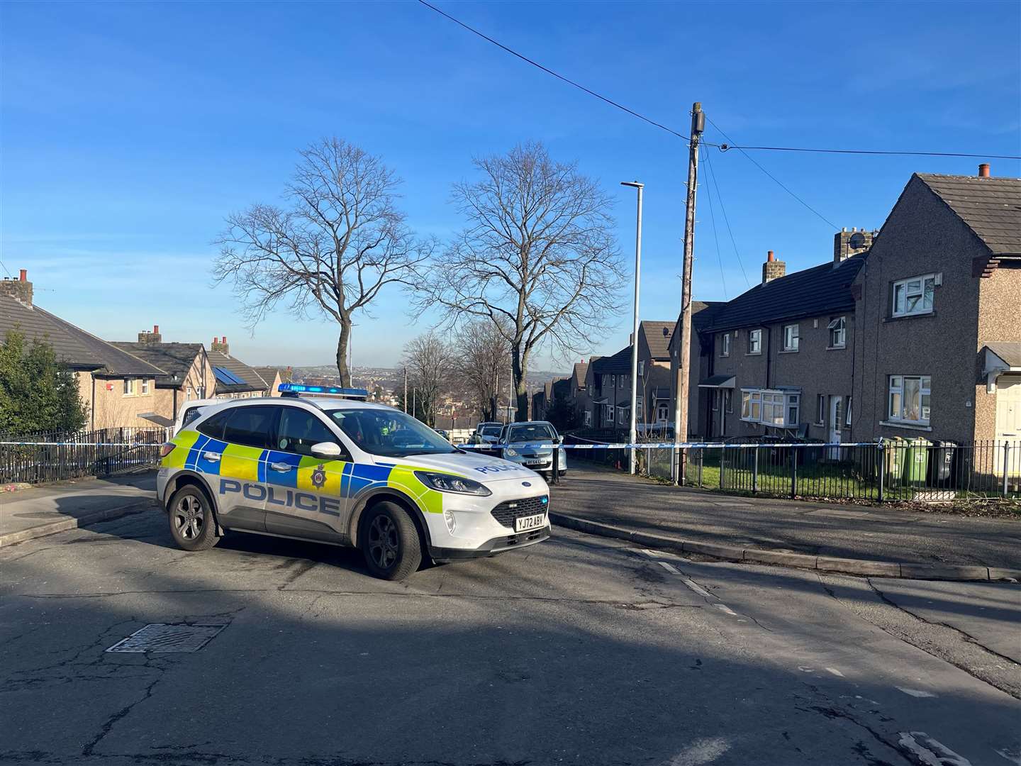 A police cordon near to a property in Walpole Road, Huddersfield (Kate Dickinson/PA)