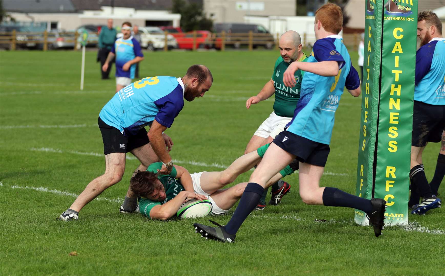 Craig Cannop scores a try for Caithness 2nd XV, helping the team to a 38-27 win. Picture: James Gunn