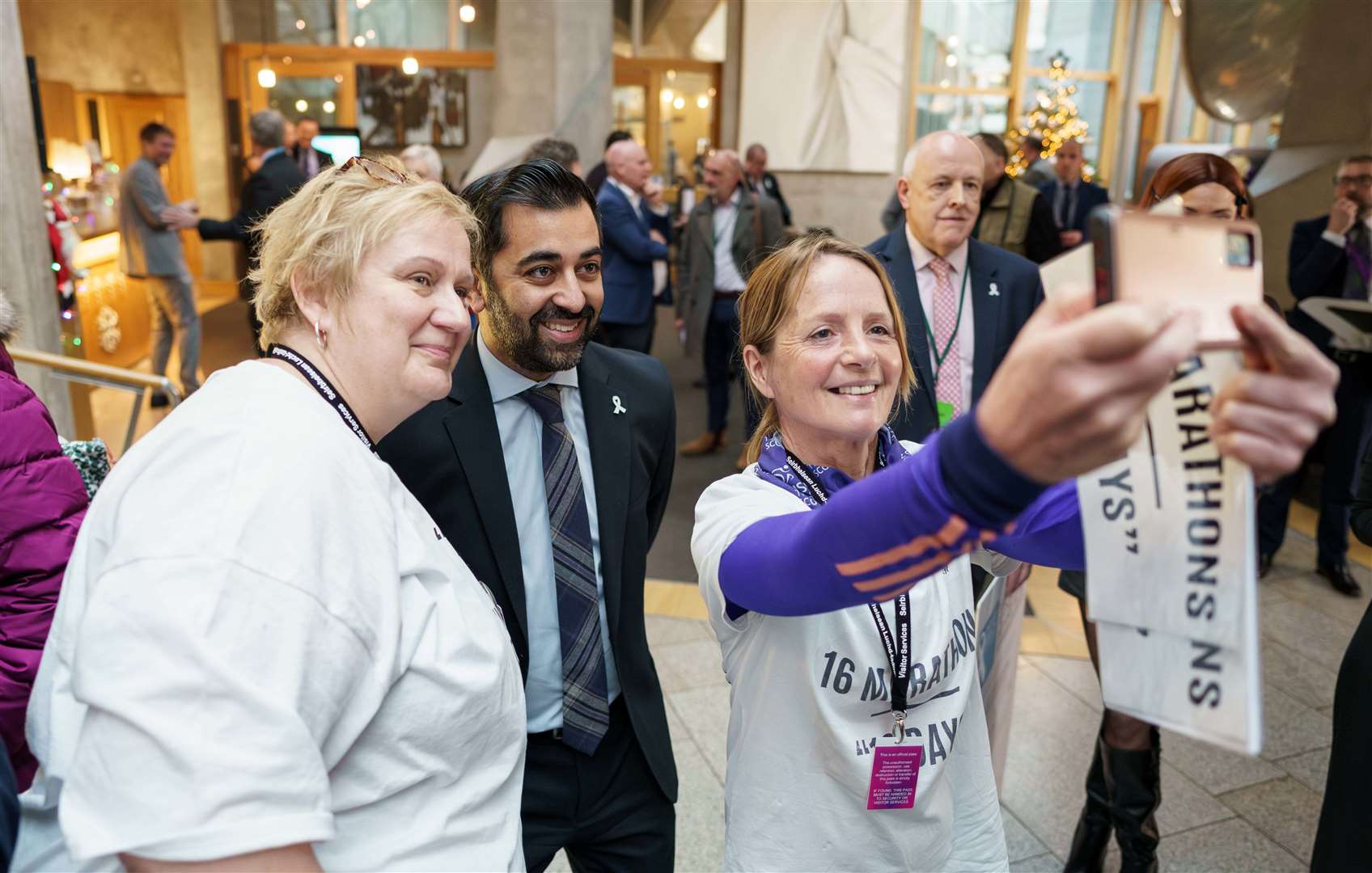 Lorna Stanger (right) and Myra Ross with Humza Yousaf at the Holyrood event.