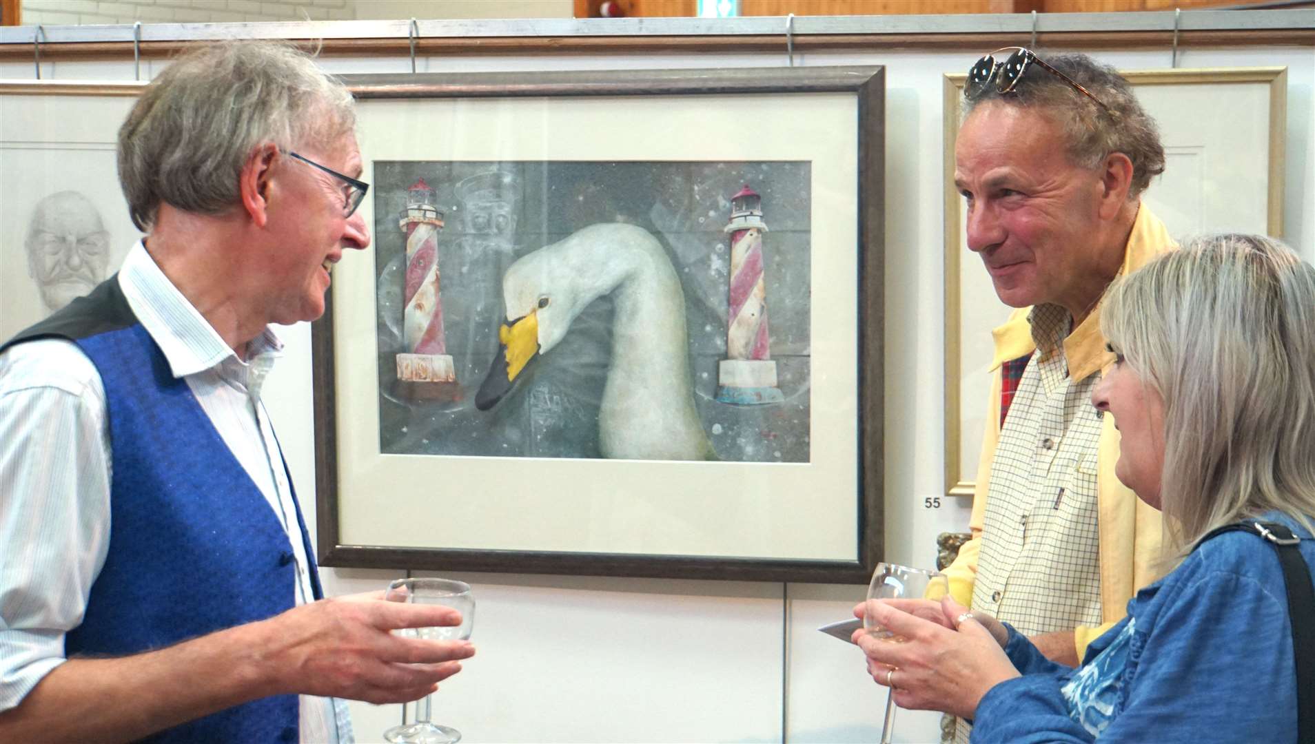 Ian C Scott (right) commands high prices for his paintings when exhibiting at the Thurso art show. Picture: DGS