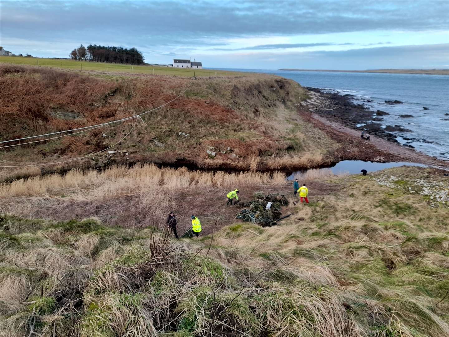 The Caithness Beach Cleans volunteers tackle the problem of removing the huge number of creels from a coastal inlet near the John O'Groats Mill. Pictures: Dorcas Sinclair