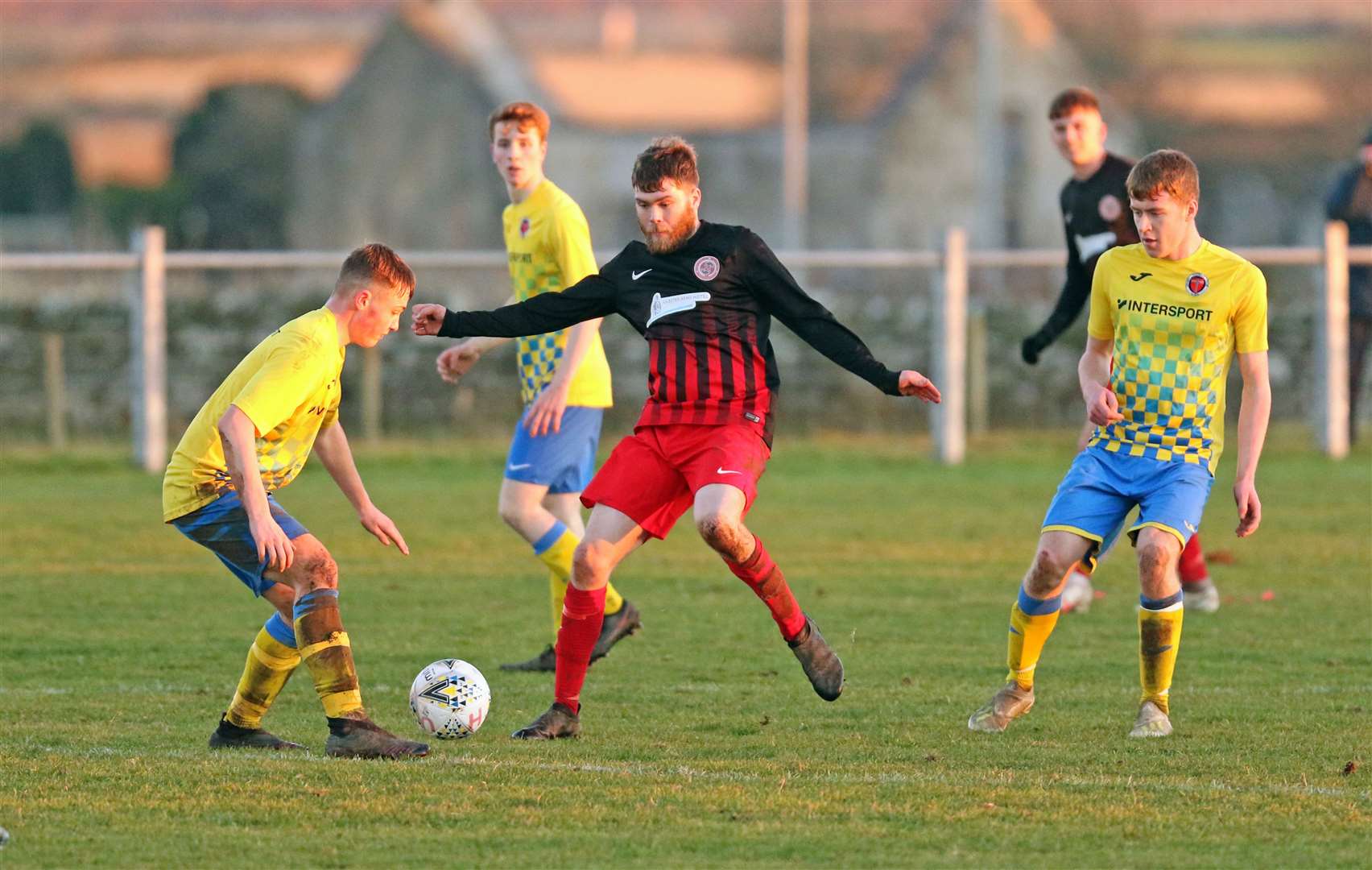 Chrissy Green in the thick of the action during Halkirk United's recent 1-0 home victory over Orkney in Division One of the North Caledonian League. Picture: James Gunn