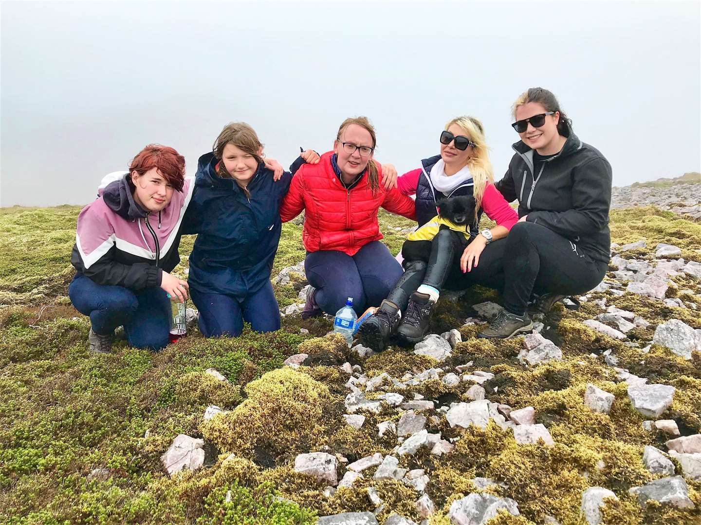 Stable owner Natalie Oag often takes her students on team building exercises such as this climb to the summit of Scaraben. From left, Sophie Bell, Gina Lewis, Eleanor Hargrave, Natalie Oag with her dog Louis and Sophie Morgan.