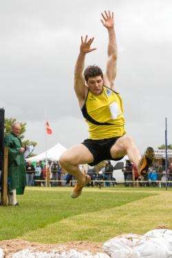 Andrew Raeburn from Thurso, on his way to winning the long jump.