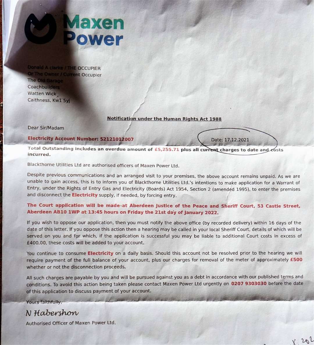 The letter sent to Mr Clark from Blackthorne Utilities Ltd, an agent working on behalf of Maxen Power, saying the company was obtaining a court warrant to 'force entry' to his property and disconnect the electricity supply. Picture: DGS