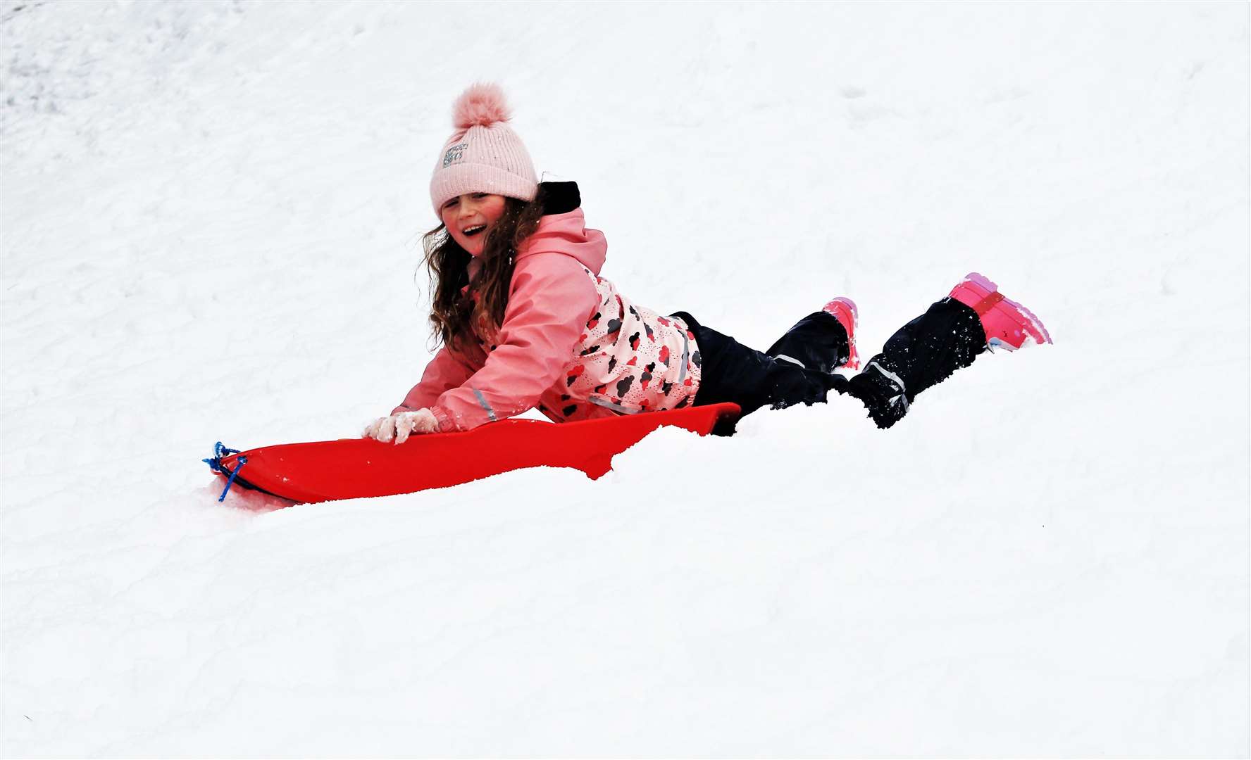 Ella Farquhar age 7 sledging in Wick on Tuesday. Picture: Alan Hendry