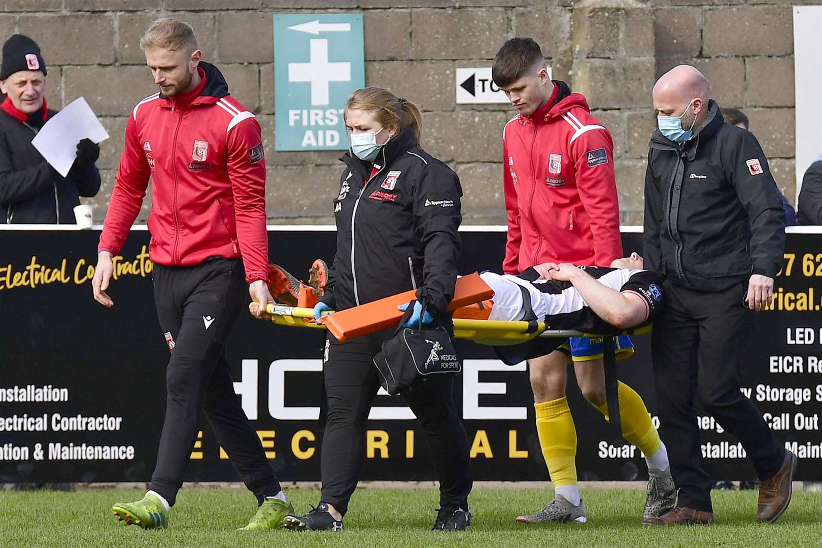 Davie Allan is stretchered off after injuring his left knee at Inverurie's Harlaw Park in April. Picture: Mel Roger