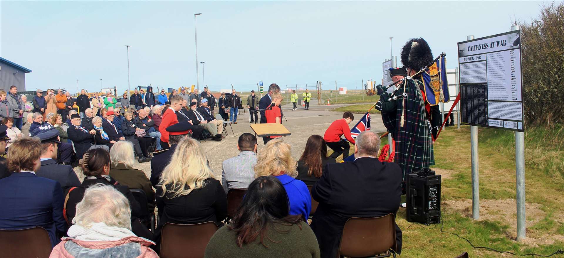 Noss Primary School pupils laying remembrance crosses during Saturday's event. Picture: Alan Hendry