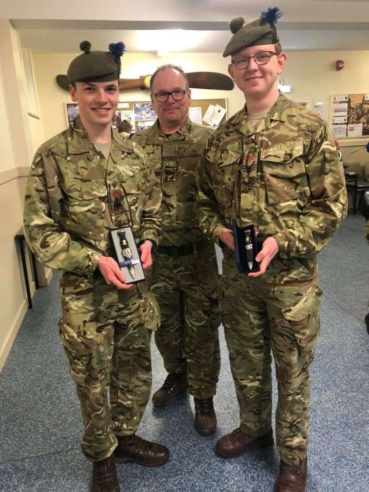 Cadet Regimental Sergeant Major Tristan Jack (left) and Cadet Sergeant Kieran Sutherland-West with their sgian-dubhs presented by company training officer Sergeant Instructor Brian Dods. Picture: Lani Jones