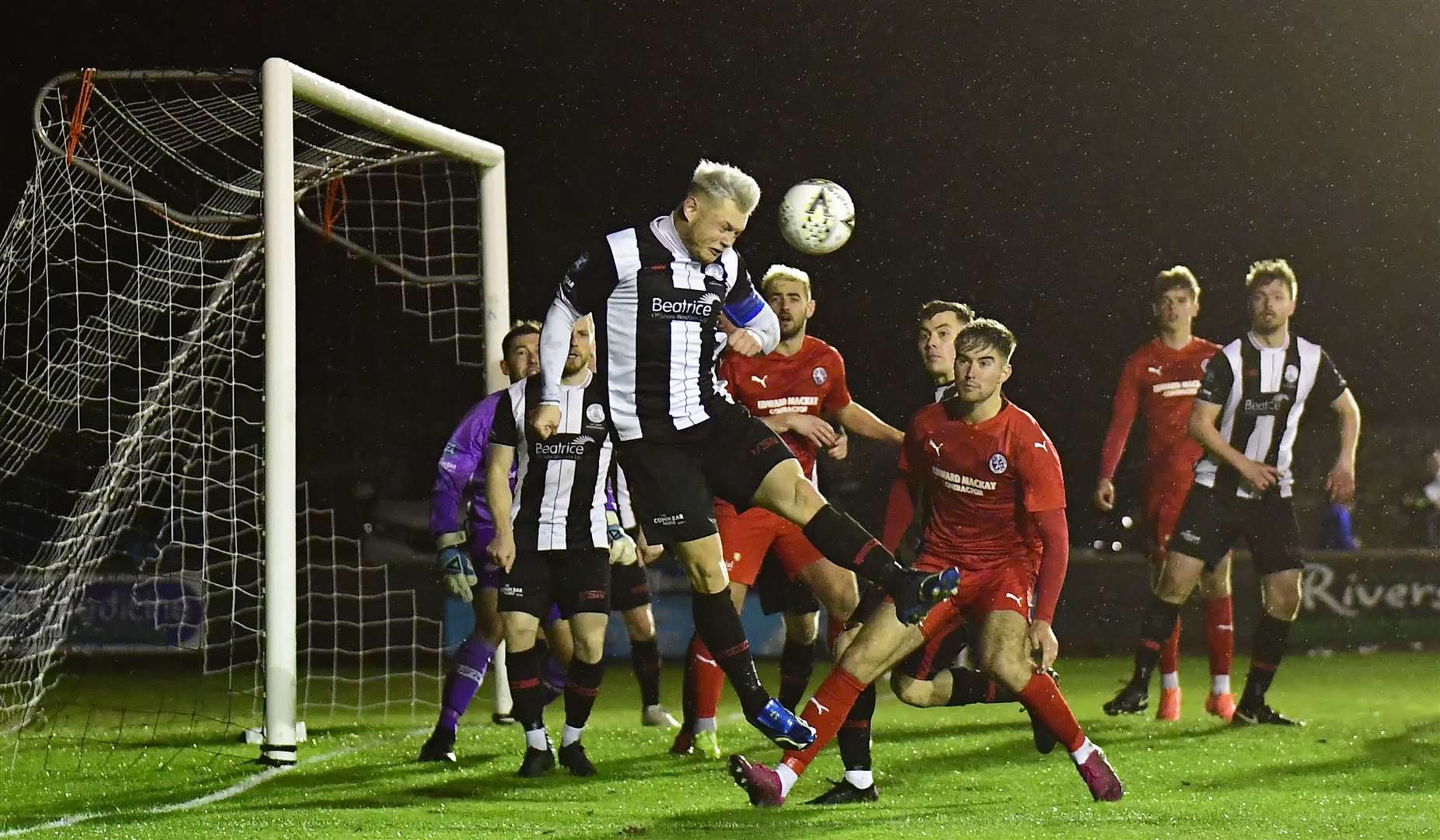 A clearing header by Wick Academy captain Jack Halliday during the second half of Wednesday's home defeat to Brora Rangers. Picture: Mel Roger